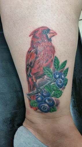 Explore blue bird tattoo ideas, creative tattoo ideas in Taylor, available at Solid Tattoo LLC