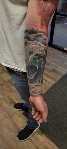 Explore red ink tattoo ideas, creative tattoo ideas in Seymour, available at 3 Sevens Tattoo