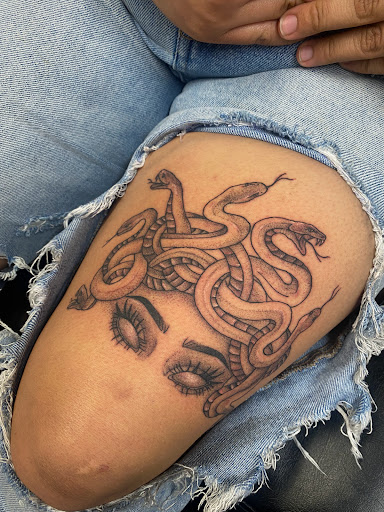 Explore knee tattoo ideas for men, creative tattoo ideas in Idaho Falls, available at Sinner Tattoo Studio