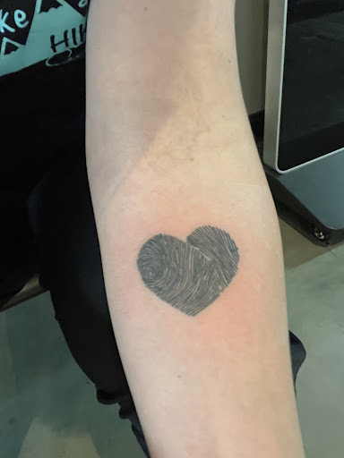 Find tattoo ideas snake for your next unique tattoo in Arlington at Urbans Tattoo & Piercing Studio