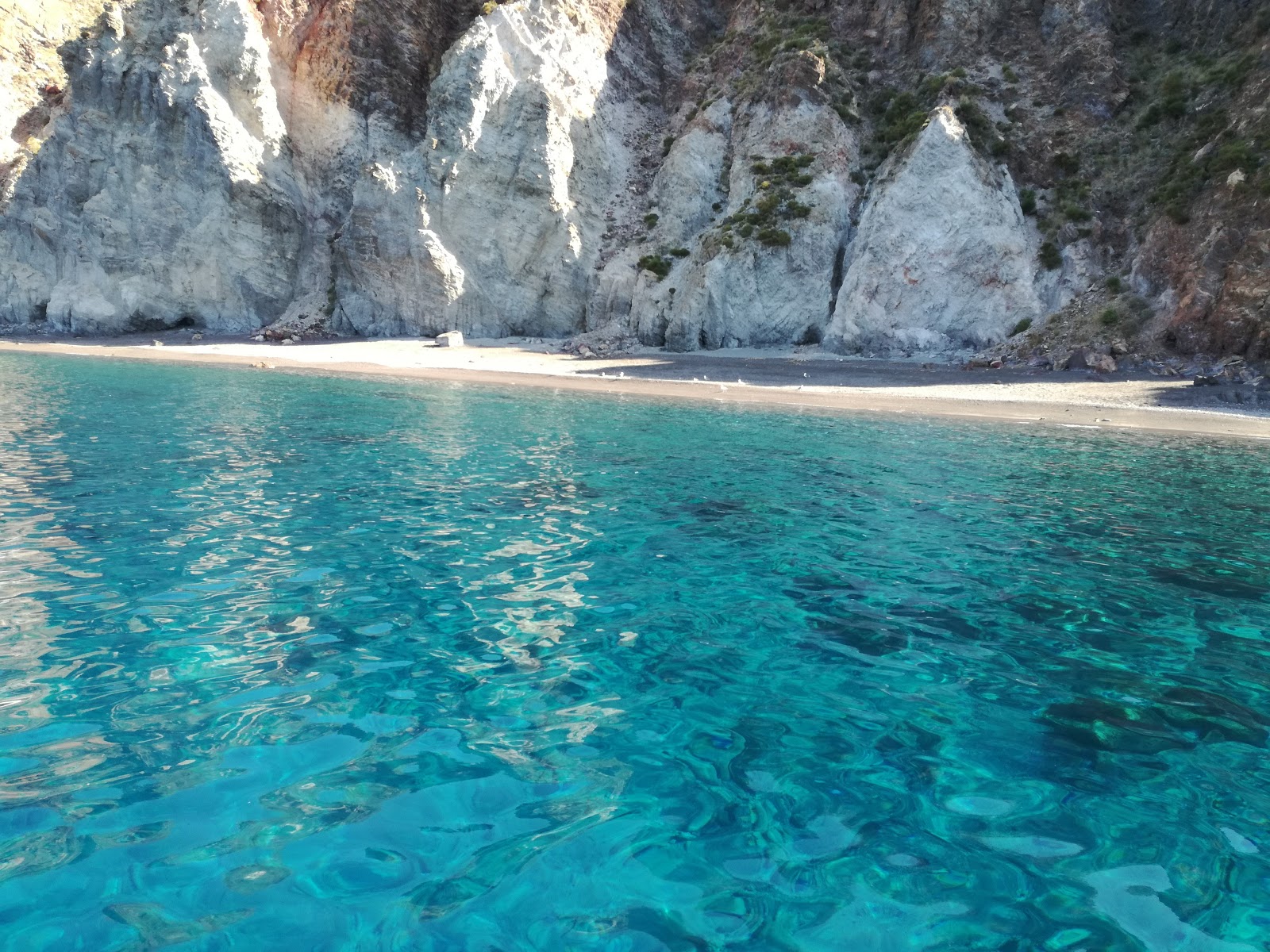Photo of Vinci beach with turquoise pure water surface