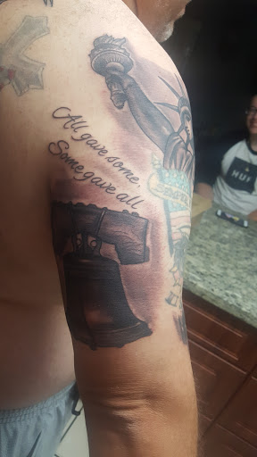 Tattoo Shop «3 Layers Deep Piercing & Tattoo Gallery», reviews and photos, 4651 N State Rd 7 #12c, Coral Springs, FL 33073, USA