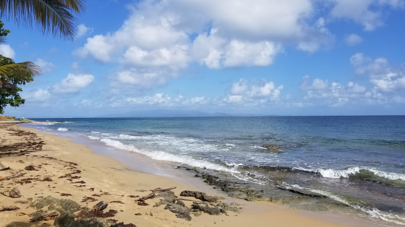 Photo of El Gallito with turquoise pure water surface