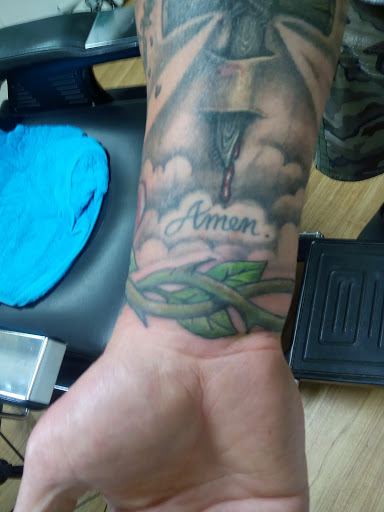 Find skull tattoo idea for your next unique tattoo in East Palestine at Bulldog Custom Tattooing