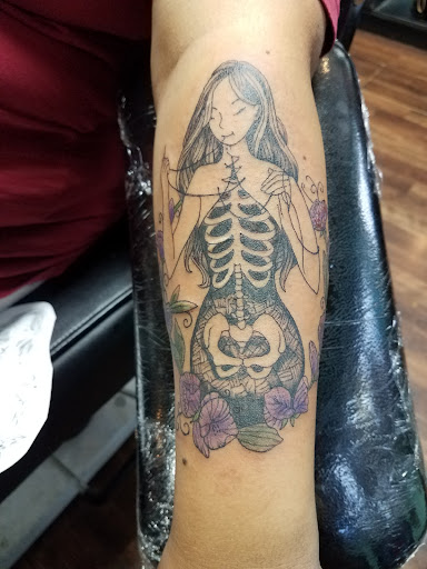 Explore rave tattoo ideas, creative tattoo ideas in Reno, available at Evolution Tattoo