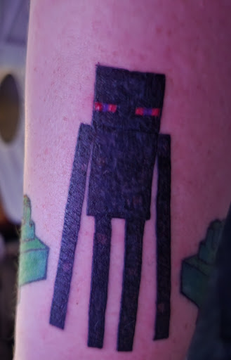 Explore black flower tattoo ideas, creative tattoo ideas in Wadena, available at Bryniarski tattoo