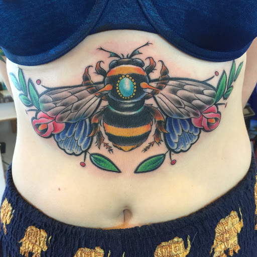 Explore dog tattoo ideas for females, creative tattoo ideas in Hanover, available at Gypsy Skull Tattoo