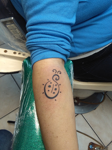 Explore let go and let god tattoo ideas, creative tattoo ideas in Bradenton, available at Memory Lane Tattoo Co.