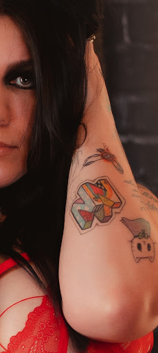 Explore lily of the valley tattoo ideas, creative tattoo ideas in Benton, available at Spectrum Tattoo