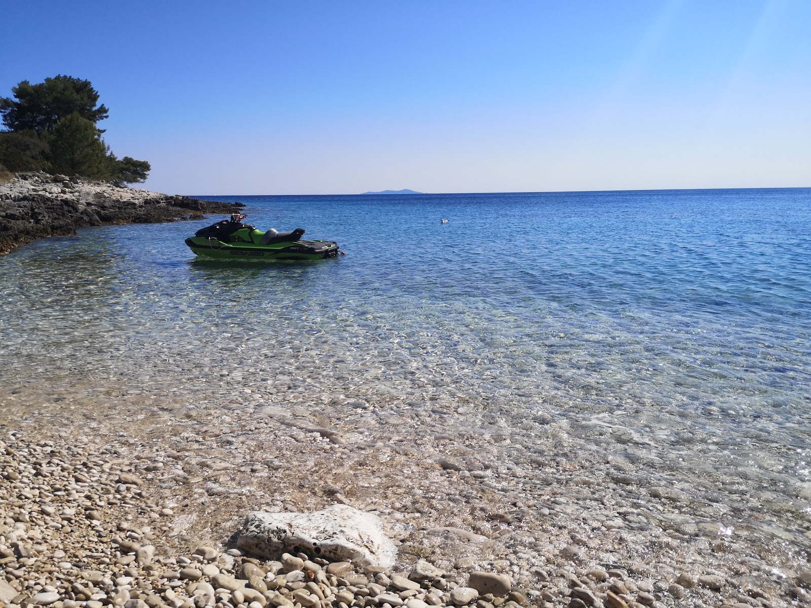 Fotografija Punta beach z turkizna čista voda površino