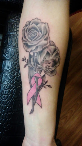 Explore tattoo ideas for happiness, creative tattoo ideas in Peru, available at Inked Memories Tattoo Company