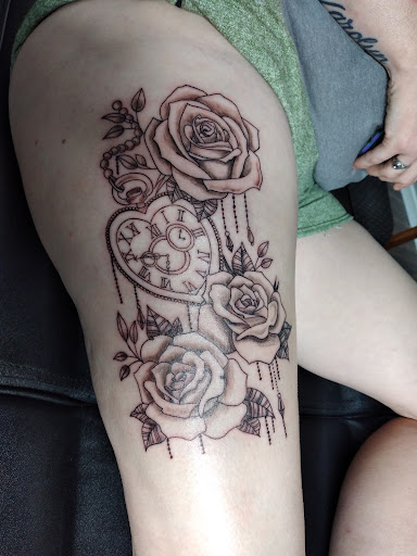 Explore women's tattoo sleeve ideas, creative tattoo ideas in Kewanee, available at Splat Ink tattoos and piercings