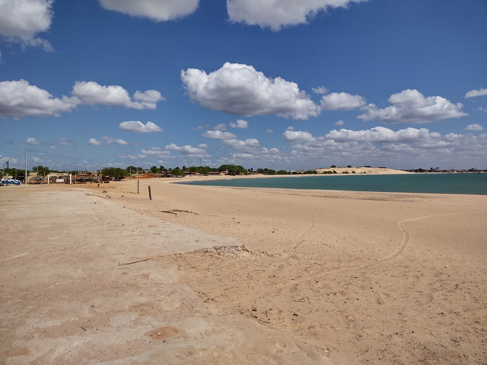 Fotografija Svetilnik plaža z svetel pesek površino