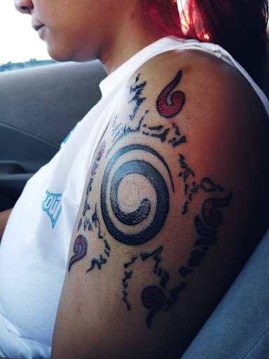 Explore divorce tattoo ideas, creative tattoo ideas in Grenada, available at Badlands Ink