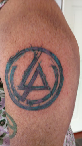 Explore mens family tattoo ideas, creative tattoo ideas in Coquille, available at Inspired Ink Tattoo Shop