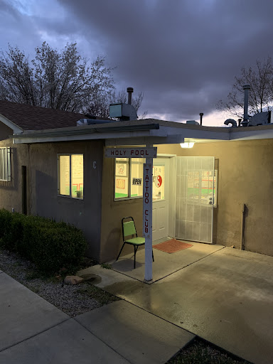 Explore tramp stamp cover up tattoo ideas, creative tattoo ideas in Albuquerque, available at Holy Fool Tattoo Club