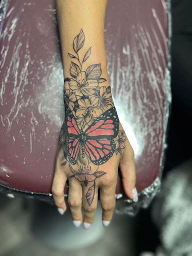 Explore good hand tattoo ideas, creative tattoo ideas in Warner Robins, available at Untold Pain Tattoo Studio