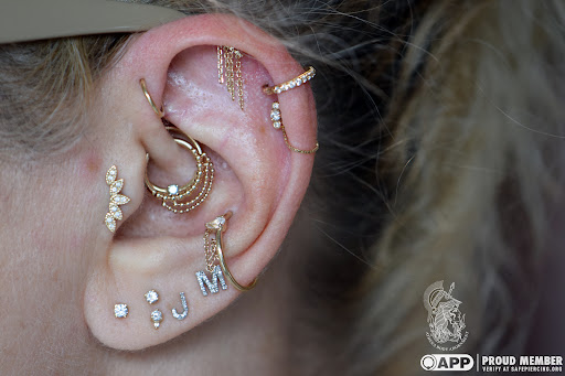 Explore spider tattoo ideas, creative tattoo ideas in Pompano Beach, available at Athena Body Adornment