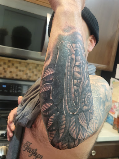 Explore tattoo ideas for nephew, creative tattoo ideas in Perris, available at Downtown Tattoos Perris