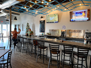 A pint of beer on a bar