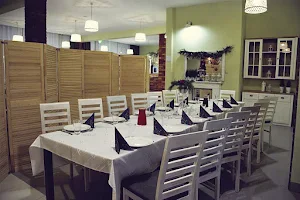 Restauracja Zachwiany Kociołek image