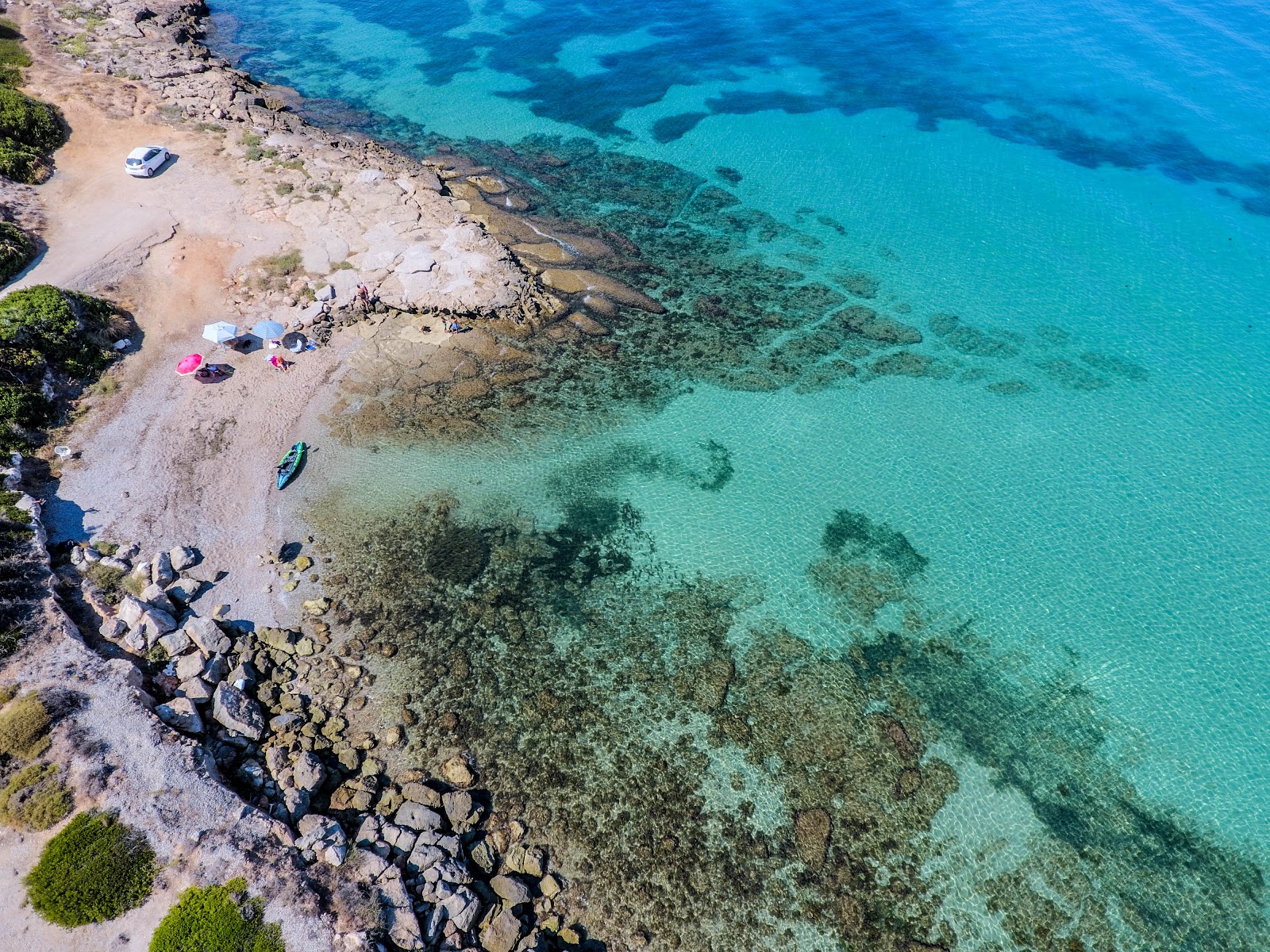 Foto av Generals beach med turkos rent vatten yta
