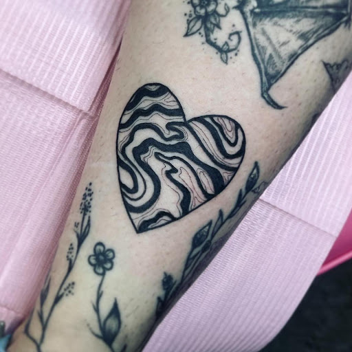 Explore barn owl tattoo ideas, creative tattoo ideas in Saint Paul, available at Black Coffin Tattoo