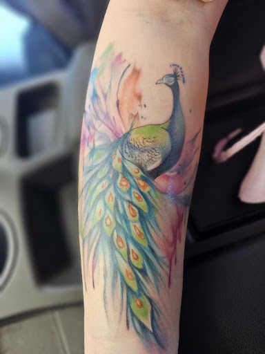 Explore jelly fish tattoo ideas, creative tattoo ideas in Myrtle Beach, available at Elite Ink Tattoos of Myrtle Beach