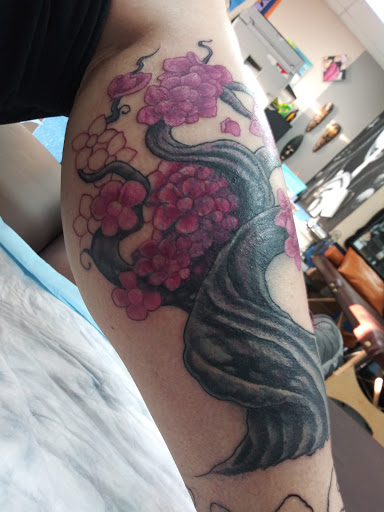 Explore autism tattoos ideas, creative tattoo ideas in Grand Junction, available at 50 Shades of Pain Tattoo and Art Studio