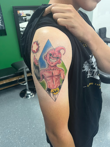 Explore emerald tattoo ideas, creative tattoo ideas in La Vista, available at InkedUp Needles