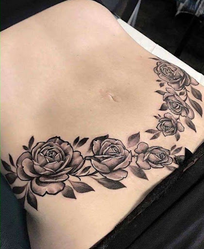 Explore women's lower back tattoo ideas, creative tattoo ideas in Arlington, available at Tat2z4Life LLC Tattoos and Body Piercings BY ALMA