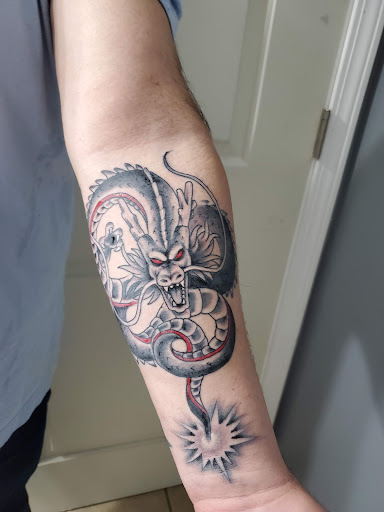 Explore smile now cry later tattoo ideas, creative tattoo ideas in Ann Arbor, available at Spiral Tattoo