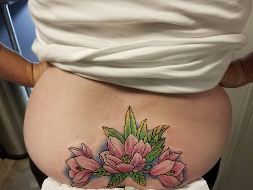 Explore rocky mountain tattoo ideas, creative tattoo ideas in Albany, available at Tat Jones Ruthless Tattoos L.L.C.