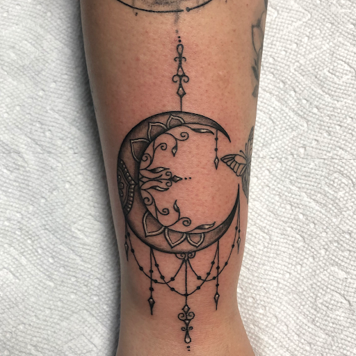 Explore cross tattoo sleeve ideas, creative tattoo ideas in Los Alamitos, available at Mr. Inkwells Classy Tattoos