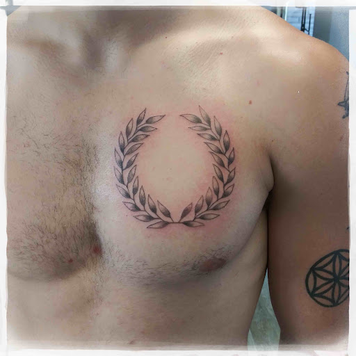 Explore earlobe tattoo ideas, creative tattoo ideas in La Crosse, available at La Crosse Tattoo