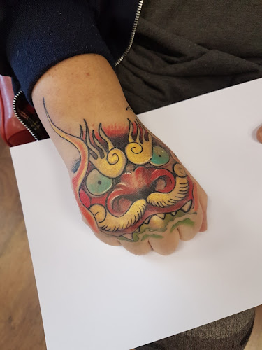 Comments and reviews of Blazin' Guns Tattoo Studio