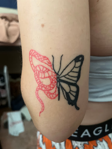 Explore blue october tattoo ideas, creative tattoo ideas in Lubbock, available at Lubbock Ink Brow Pink Tattoo Studio