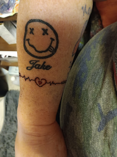 Explore small paw print tattoo ideas, creative tattoo ideas in Jasper, available at Brothers Keeper Tattoo Shop