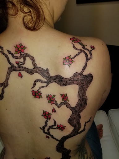 Explore guardian angel tattoo ideas, creative tattoo ideas in Onalaska, available at Divine Designs tattoo studio