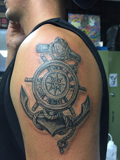 Explore thigh tattoo ideas for females, creative tattoo ideas in Omaha, available at A New Creation Tattoo