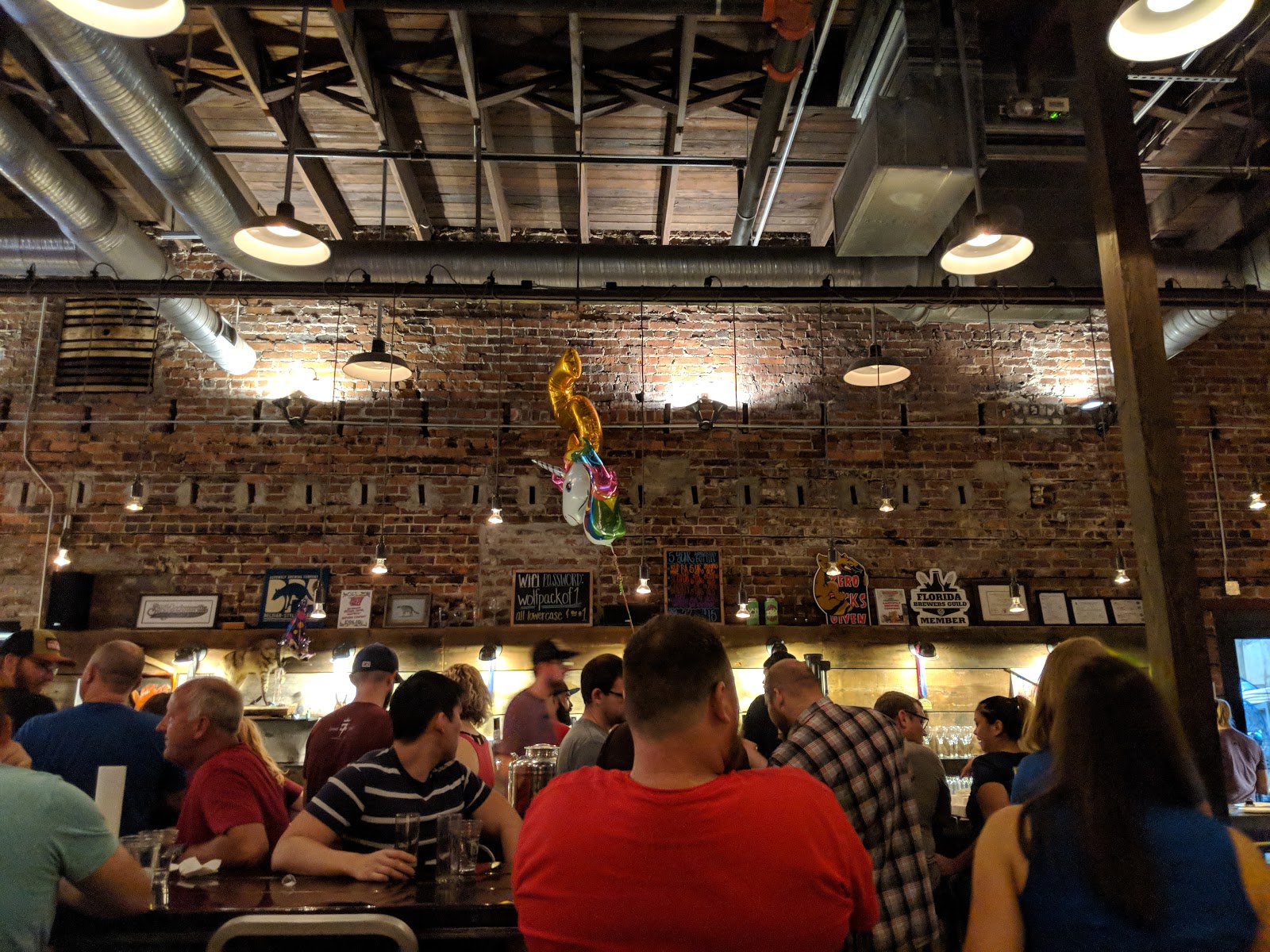 Friends sharing beers at a table