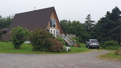 Fiddler's Green Log Tourist Cabins