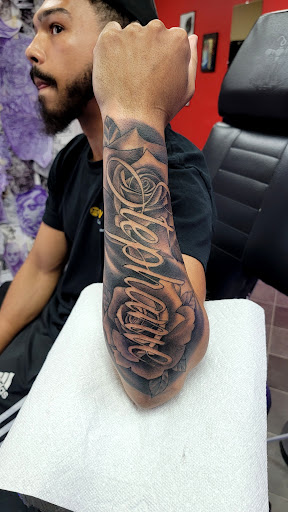 Explore muscle tattoo ideas, creative tattoo ideas in Richmond, available at Captured Moment Tattoos
