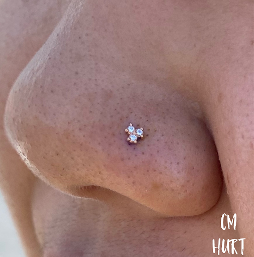 Explore cross with names tattoo ideas, creative tattoo ideas in Garden Grove, available at CM Hurt Piercing & Jewelry