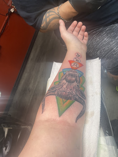 Explore lower back tattoo ideas for females, creative tattoo ideas in Crosby, available at Seven Ink Tattoos And Piercings