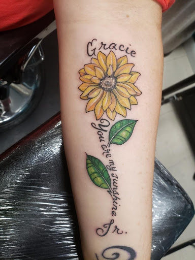 Explore cherub angel tattoo ideas, creative tattoo ideas in Homosassa, available at Citrus Tattoos