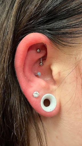 Explore colored tattoo ideas for men, creative tattoo ideas in Arlington, available at Benchmark Tattoos