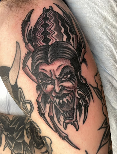 Explore rose sleeve tattoo ideas, creative tattoo ideas in Delmar, available at Resolute Tattoo