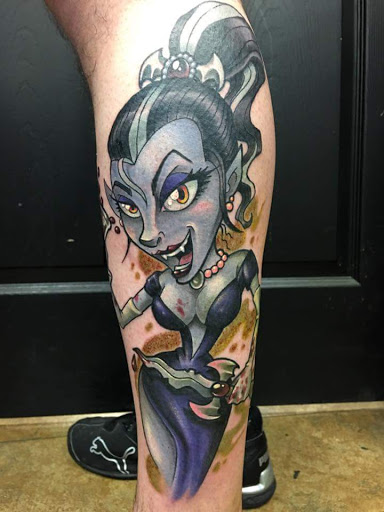 Explore butterfly spine tattoo ideas, creative tattoo ideas in Jackson, available at Tattoo Station