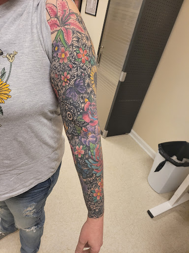 Explore bourbon glass tattoo idea, creative tattoo ideas in Ozark, available at Tooth & Nail Tattoo & Piercing